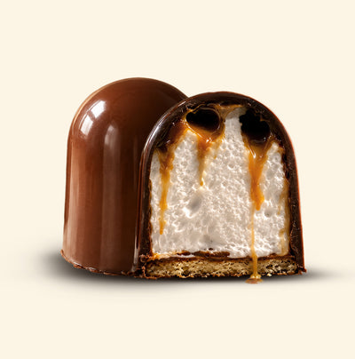 Dubai Kiss - Mocha flødebolle cut in half showing marshmallow with mocha caramel drizzle